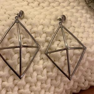 Three dimensional diamond with cross earrings.